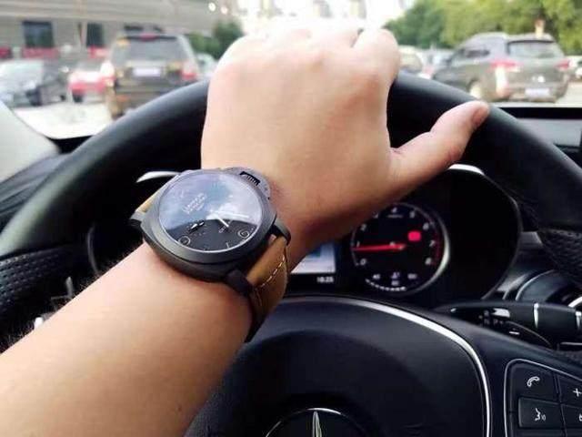 Black Panerai copy watches seem to be in harmony with black car.